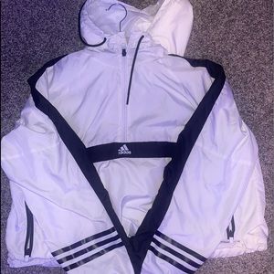 Brand new ADIDAS windbreaker.